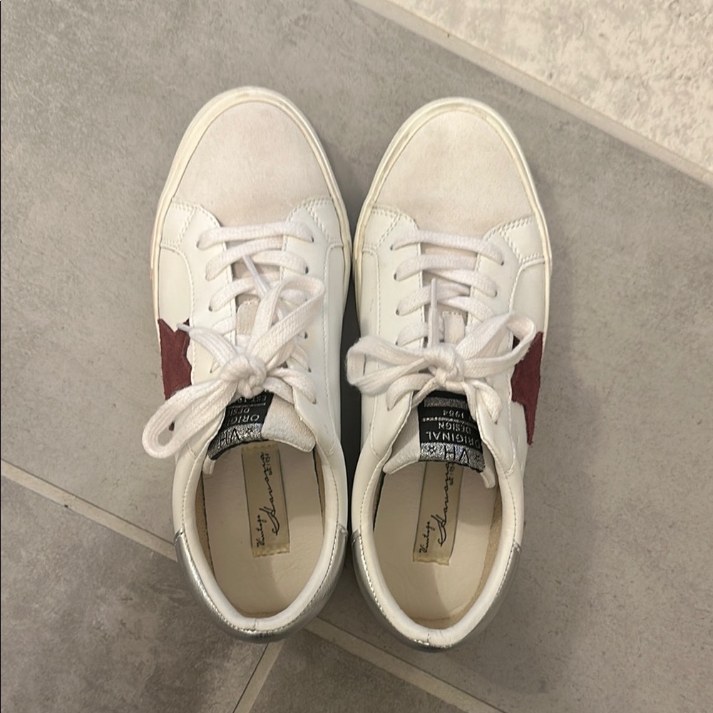 White Sneakers with Red Star Detail